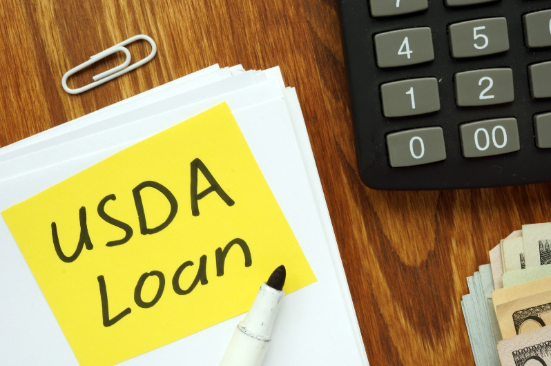 Sticky note with USDA loan written on it